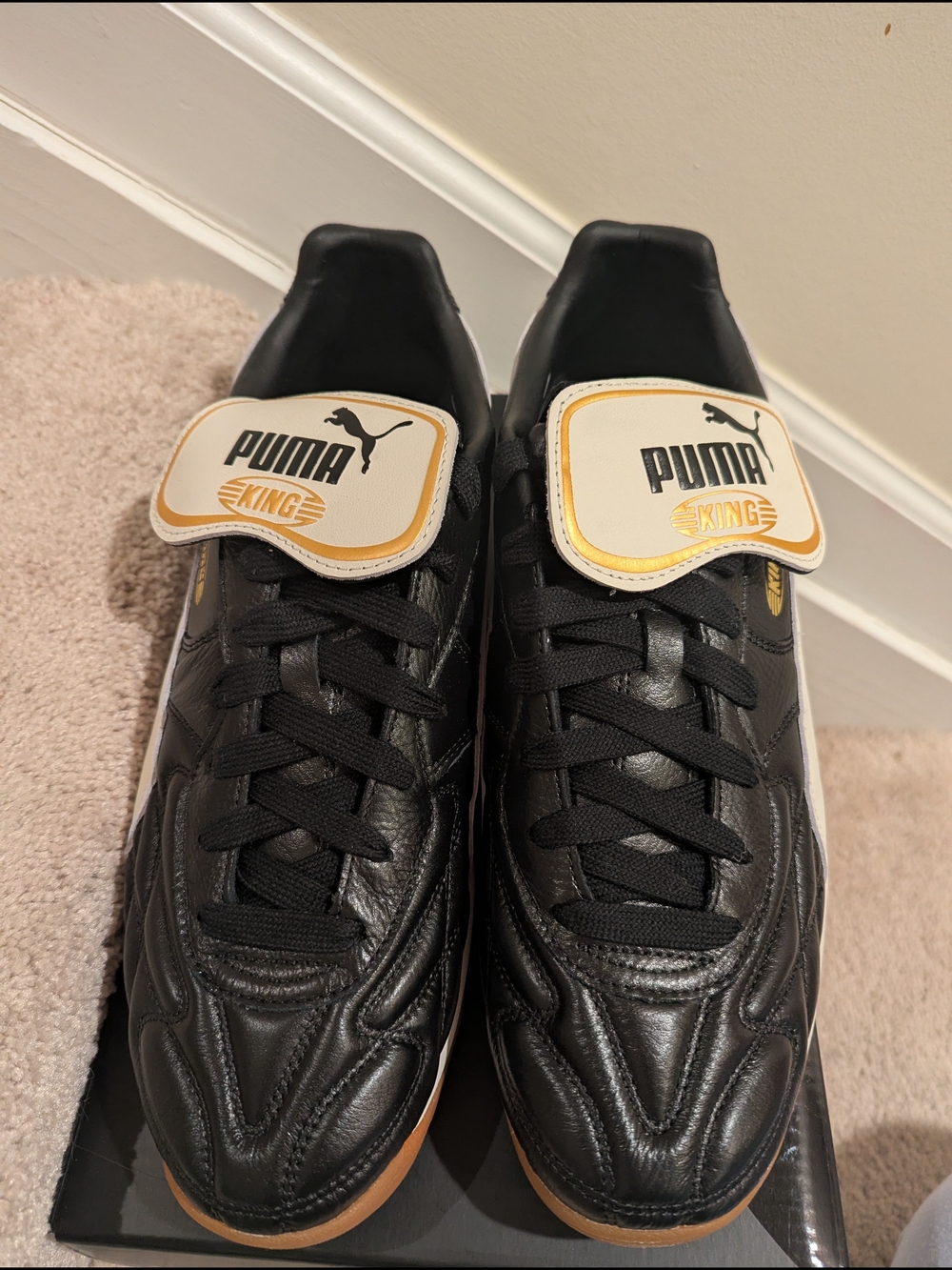 Puma Men’s Leather Athletic Sneakers — Black with Gold Accents